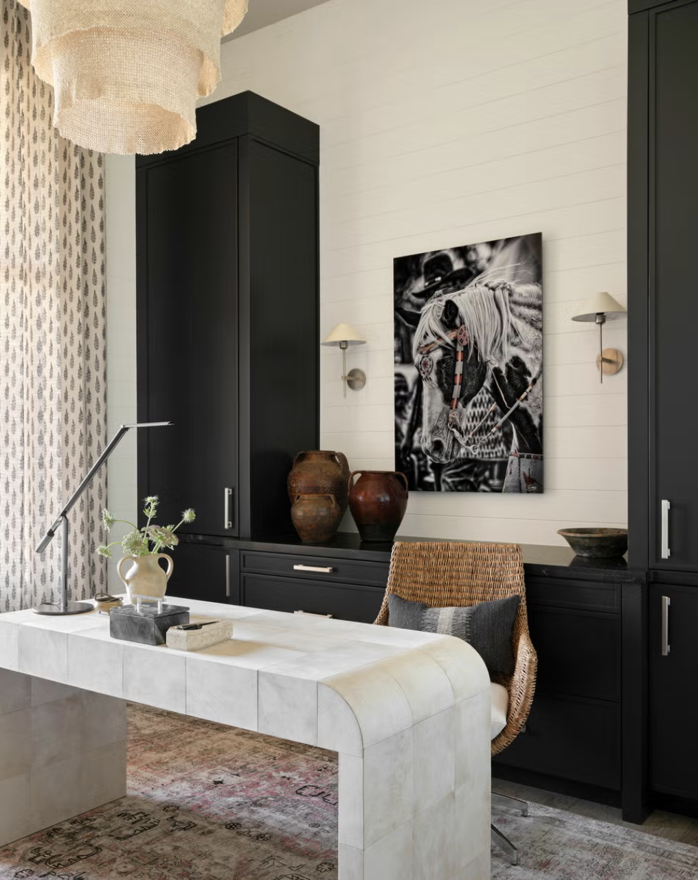 timeless living area featuring a mix of classic furniture pieces, built-ins, and warm neutral tones with collected décor.